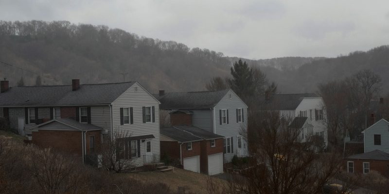 Pennsylvania hillside borough with rows of modest brick and sided homes on steep streets