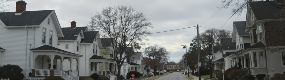 Pennsylvania small-town residential street of Victorian and foursquare houses with deep porches